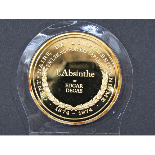 2265 - A complete collection of fifty silver gilt “Les Chefs- D’Oeuvre De L’ Impressionnisme” medallions fe... 