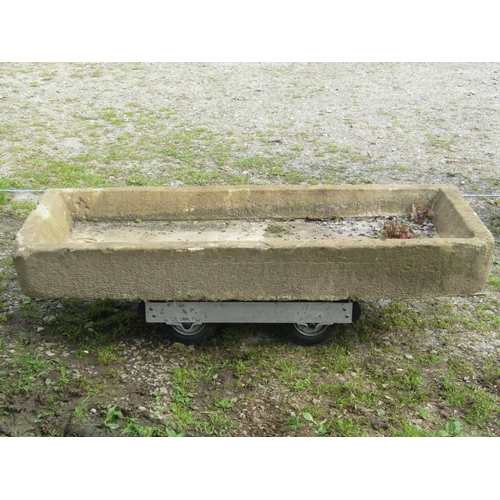 104 - A shallow rectangular but thick walled natural stone sink/trough, with rounded front corners and sin... 