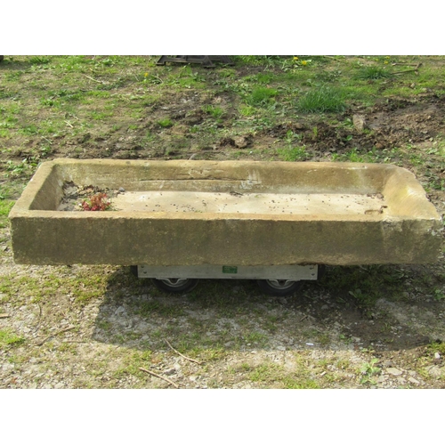 104 - A shallow rectangular but thick walled natural stone sink/trough, with rounded front corners and sin... 