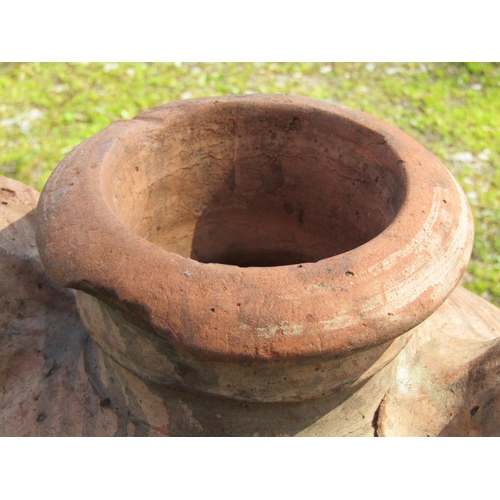 221 - Two similar weathered terracotta jars with reeded collars (af) slight variation in height, the large... 