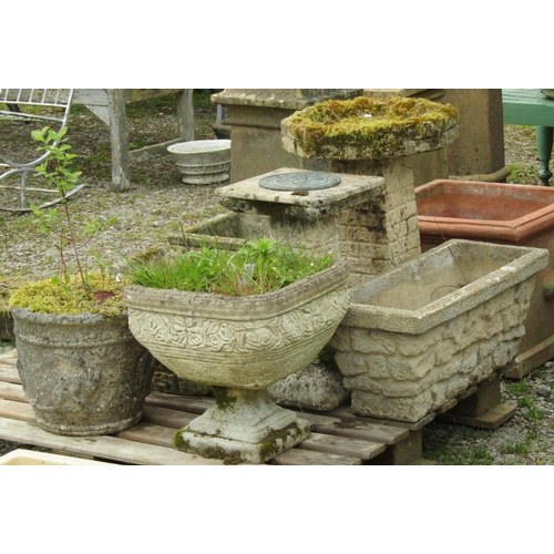 149 - Five weathered cast composition stone planters of varying size and design with relief detail, togeth... 