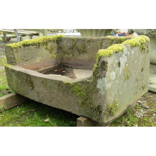 176 - A weathered substantial (thick walled) rectangular natural stone trough with drilled drainage hole, ... 