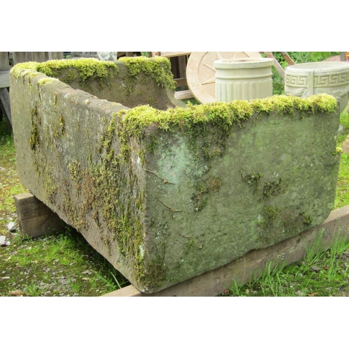 176 - A weathered substantial (thick walled) rectangular natural stone trough with drilled drainage hole, ... 