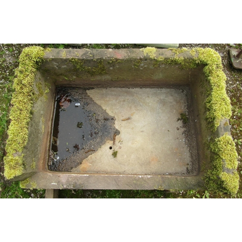 176 - A weathered substantial (thick walled) rectangular natural stone trough with drilled drainage hole, ... 