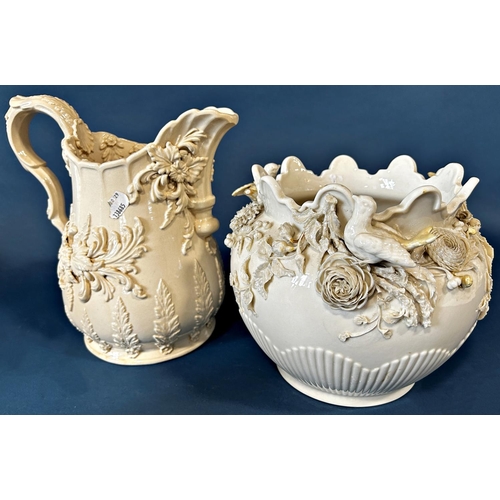 2008 - A Belleek jardinière with applied bird and rosebud detail, a further cream ground jug with applied f... 