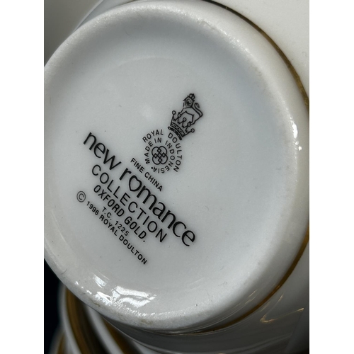 2041 - A collection of Royal Doulton Oxford gold dinner, tea and coffee wares, etc