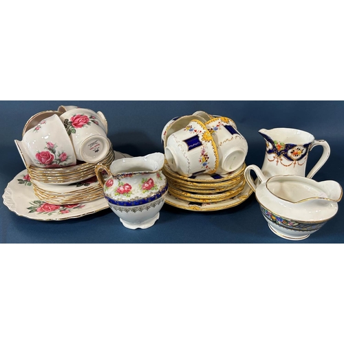 2056 - A miscellaneous collection of tea ware including Royal Vale Moss rose pattern, Royal Osbourne Rosebu... 