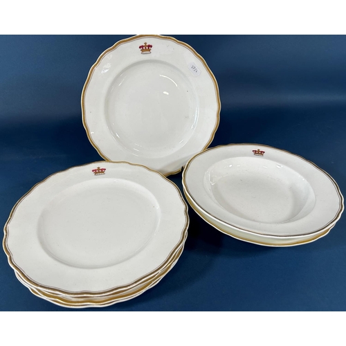 2061 - A collection of 19th century armorial tableware retailed by Phillips and Goode, principally soup bow... 