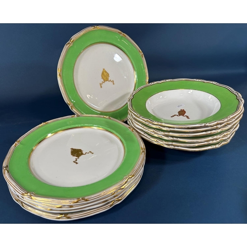 2061 - A collection of 19th century armorial tableware retailed by Phillips and Goode, principally soup bow... 