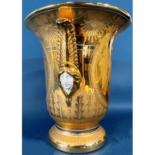 2070 - A pair of brush vases in a white and gilt colourway with spread eagle, acanthus, facial mask and oth... 