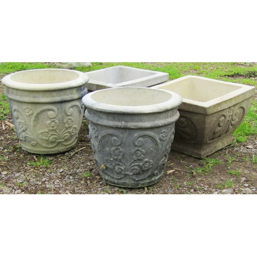 125 - A pair of weathered cast composition stone squat square tapered planters with repeating anthemion de... 