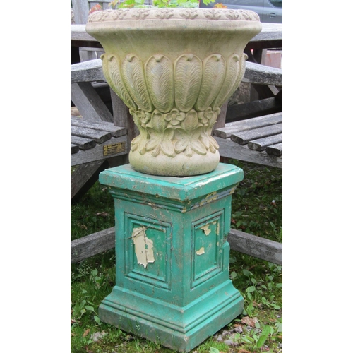 197 - A weathered cast composition stone circular tapered garden urn with repeating foliate detail, 40 cm ... 