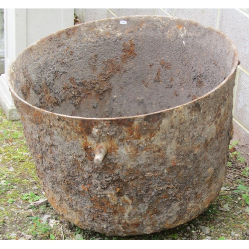 243 - A large antique cast iron cauldron 76cm diameter x 62cm high approximately (af) (appears to have bee... 