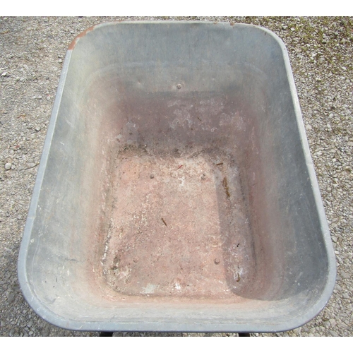 244 - A large galvanised two wheeled wheelbarrow with tubular frame and handle