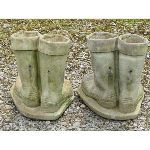 247 - Two novelty pairs of cast composition stone wellington boot planters 34 cm high