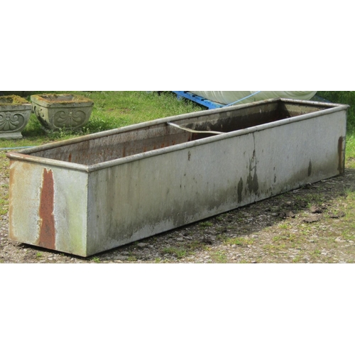 80 - A galvanised steel rectangular field water trough with simple central strap division, 247cm long x 4... 