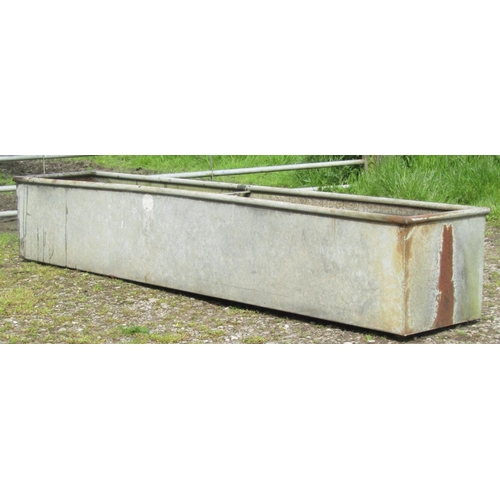 80 - A galvanised steel rectangular field water trough with simple central strap division, 247cm long x 4... 