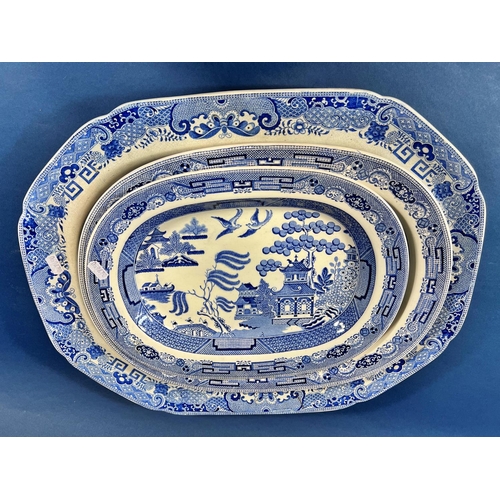 2123 - A large 19th century Pearlware meat dish, with a chinoiserie landscape pattern and two further gradu... 