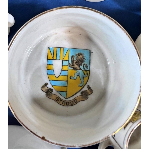 2125 - A collection of Crested ware principally Goss to include a coronation dish from 1911, a Winchester B... 