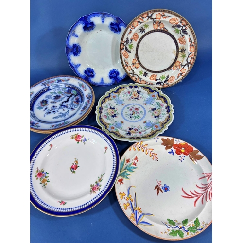 2126 - A collection of 19th century ironstone plates including a meat dish with gravy well and liner, vario... 