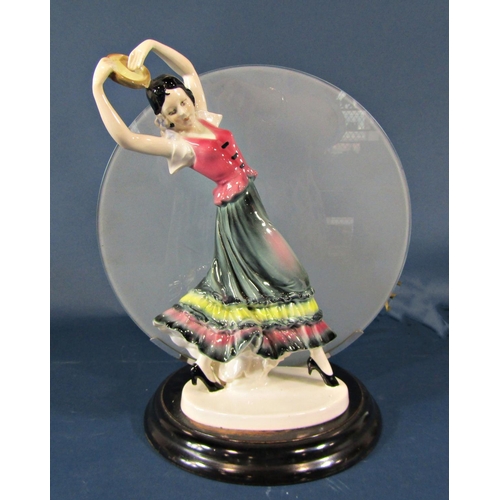 2096 - An art deco style table lamp with figure of a gypsy lady holding a pose, with glass panel shade, set... 