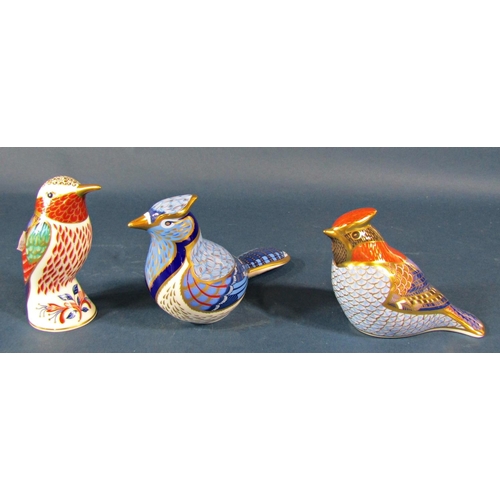 2098 - A collection of eight Royal Crown Derby Imari patterned birds with gold or silver button to bases in... 