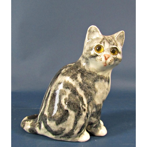 2099 - A collection of ceramic cats to include Beswick Siamese casts in various poses, a grey Winstanley ca... 