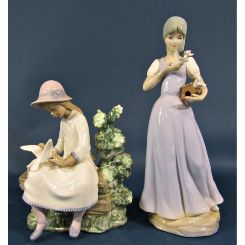 2104 - A collection of Lladro/Nao type figurines to include a girl feeding birds, three geisha girls, a whi... 