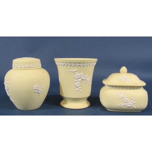 2107 - A collection of yellow Wedgwood Jasperware to include two vases, a small lidded ginger jar, further ... 