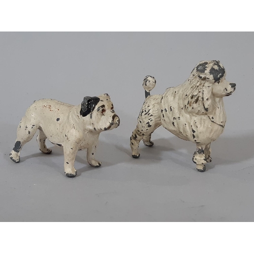 1310 - 16 vintage hollow cast lead painted dogs, made in England, playworn.