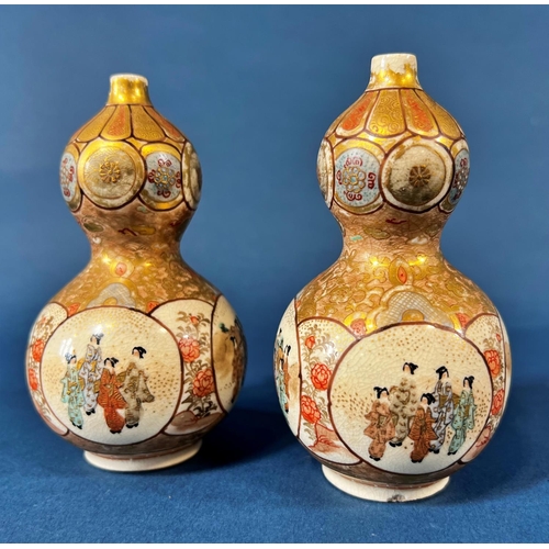 2075B - A pair of small Japanese Satsuma ware, double gourd shaped vases, finely detailed with characters, f... 