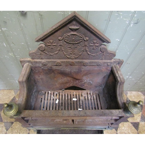 3023 - An antique Adams style cast iron and brass fire basket, with typical classical detail, together with... 