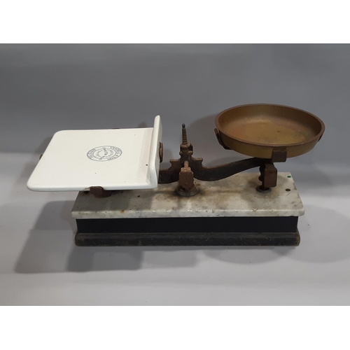 3059 - A vintage scale with heavy gauge circular brass pan and ceramic tray with transfer printed detail fo... 