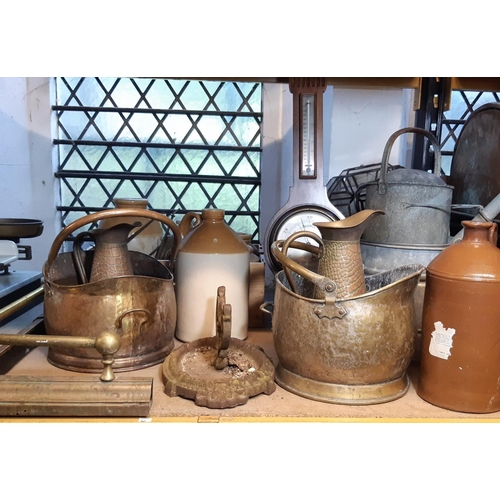 3060 - A collection of stone jars, 19th century cast iron foot scraper, cast iron water pump, galvanised ir... 