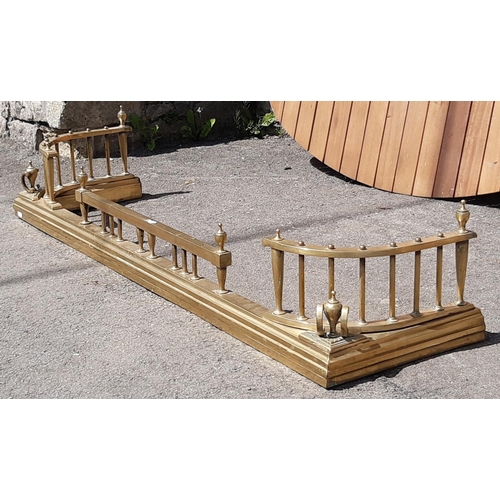 3049 - A Victorian brass fire curb with turned column supports, 132cm x 35cm