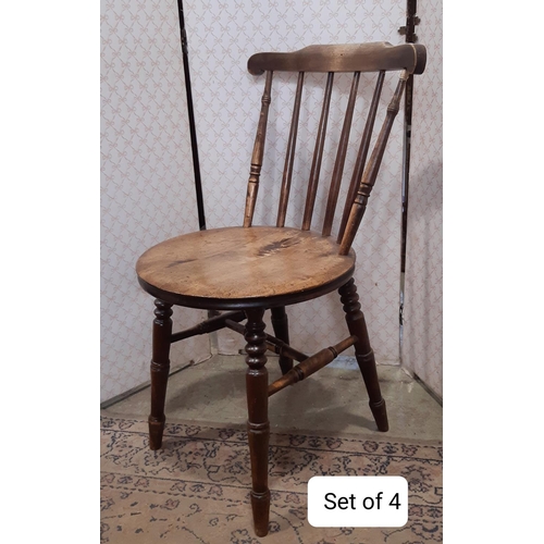 3073 - A set of four Swedish stickback dining chairs with circular seats and a further Windsor rocking chai... 