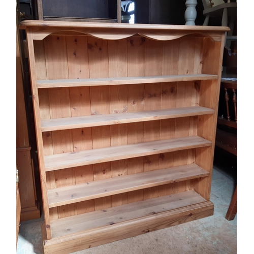 3093 - A contemporary pine bookcase of shallow proportions 98 cm high x 90 cm wide x 17 cm deep