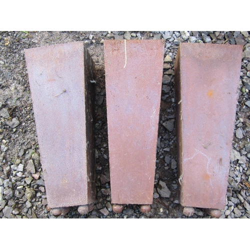 683 - A set of five weathered square tapered vases in sheet steel raised on ball supports  21 cm square ta... 