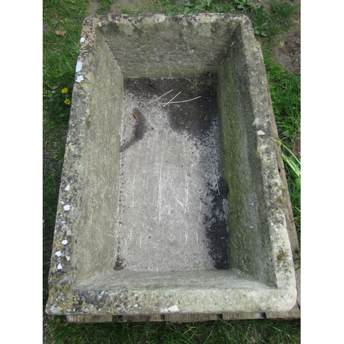 702 - A good weathered rectangular natural stone trough with tapered interior, 102 cm long x  63 cm wide x... 