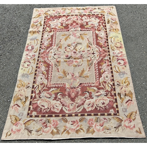 2683 - Two Aubusson style wall hangings, one with an all over rose pattern on a fawn ground, the  other, wi... 