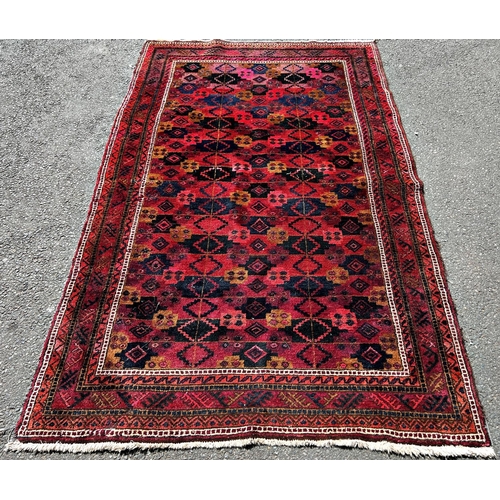 2688 - A Geometric multi coloured Middle Eastern carpet, 237cm x 144cm approx.