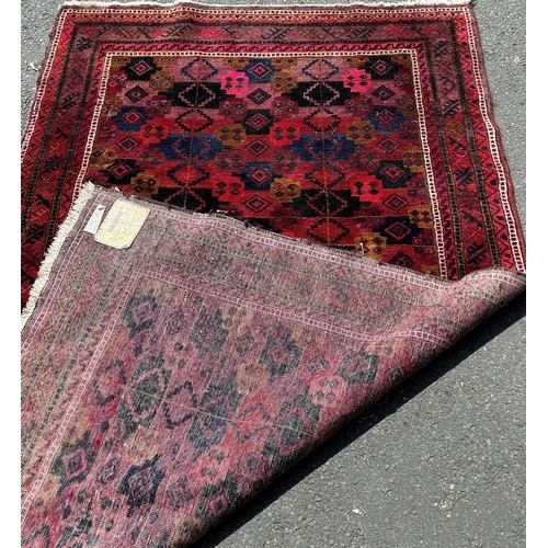 2688 - A Geometric multi coloured Middle Eastern carpet, 237cm x 144cm approx.