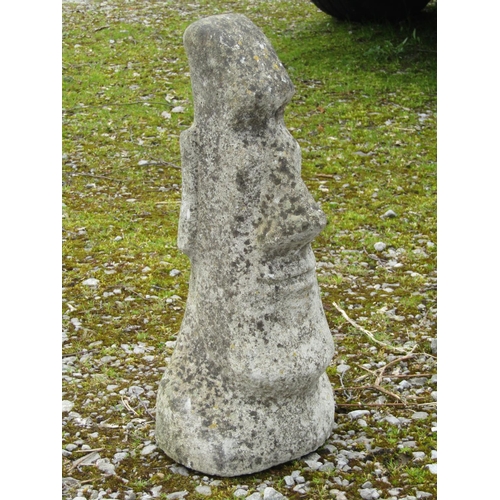 213A - A weathered cast composition stone Easter Island head garden ornament 50 cm high together with one o... 