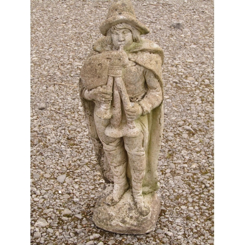 213B - A weathered cast composition stone garden ornament of a Scottish Highlander wearing a brimmed hat an... 