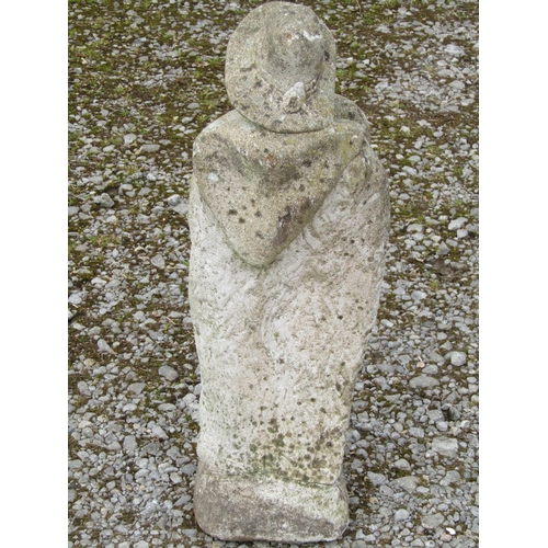 213B - A weathered cast composition stone garden ornament of a Scottish Highlander wearing a brimmed hat an... 