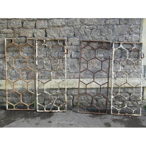 715 - Two pairs of reclaimed 19th century cast iron honeycomb pattern astragal windows (for re-glazing, co... 