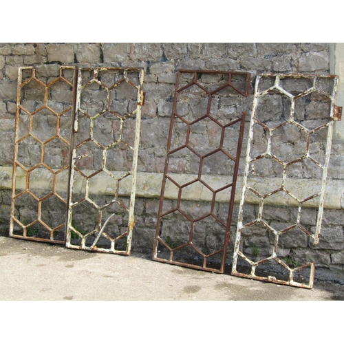 715 - Two pairs of reclaimed 19th century cast iron honeycomb pattern astragal windows (for re-glazing, co... 