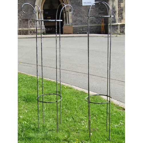 720 - A weathered galvanised steel garden obelisk of simple rod and ring construction with domed top, 175 ... 