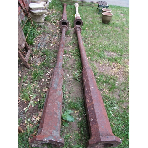 704 - A set of four weathered heavy gauge cast iron architectural columns with octagonal caps and bases, 2... 