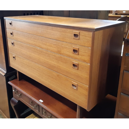 3114 - A mid century teakwood chest of four long graduated drawers by Alfred Cox 108 cm wide